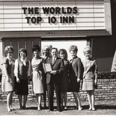 George Dement pictured with believed to be Holiday Inn staff members holding award for being named one of the World’s Top 10 Inns. C.1968. Photo from the Bossier Parish Libraries History Center