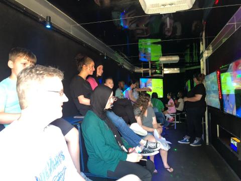 Everyone enjoying the game truck.