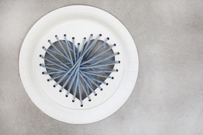 Paper plate and yarn sewing heart